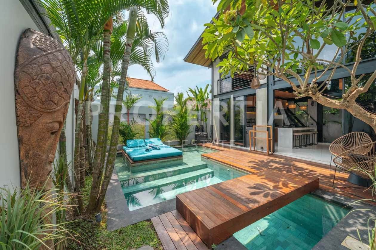 Elegant Industrial Loft Villa by Biombo Architect in Babakan