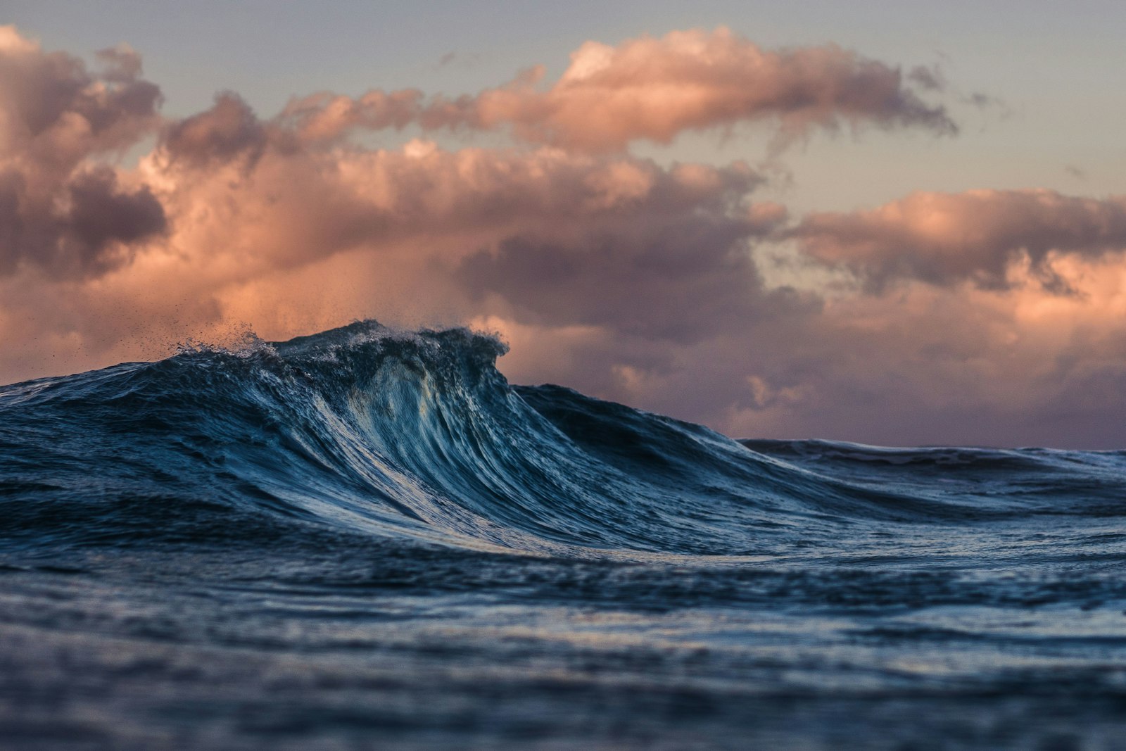 Ocean wave at dusk — Brixfox short-term-rental supply and demand data, 2026